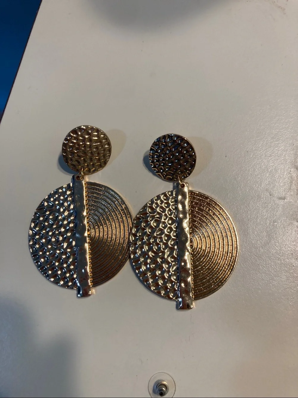 Large gold toned statement dangle earrings